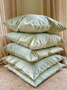 Sage green velvet cushions