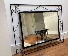 large mirror black cast iron