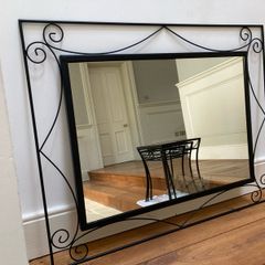 large mirror black cast iron