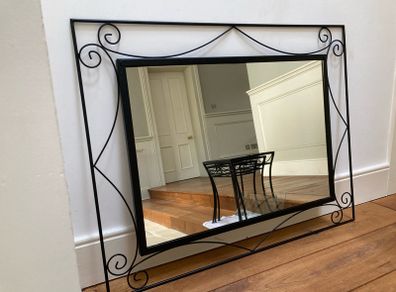 large mirror black cast iron