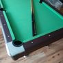 Pool table with cues and balls Image 2