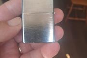 Champ Flip top petrol lighter.