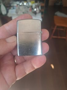 Champ Flip top petrol lighter.