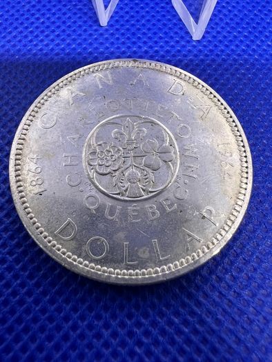 X3 Canadian silver dollar coins