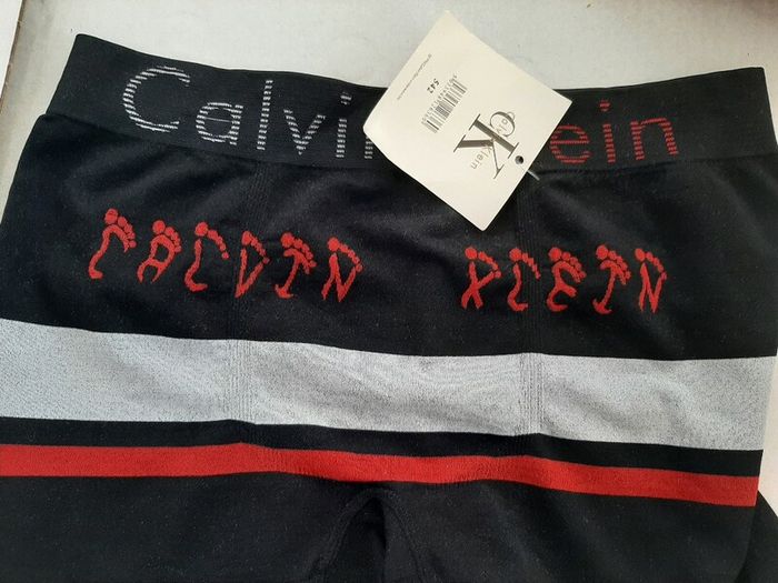 Calvin Klein tag attached