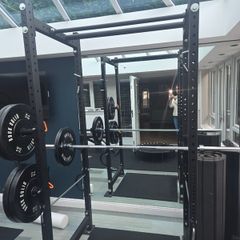 Mint condition - amazing heavy duty black squat rack with almost brand new Rock Solid barbell and bumper plates - a must see!!!