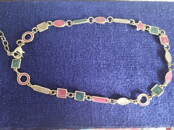 Beautiful necklace with multi-colored enamel.