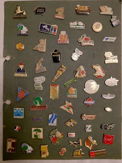 collection of over 100 Vintage Badges pin back from Volvic..Hollywood chewing gum..Fujicolor etc.