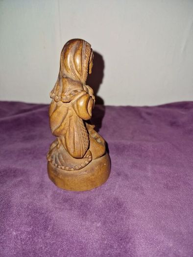 Carved praying lady statue