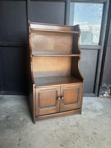 An elm Ercol Waterfall Bookcase