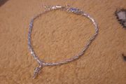 silver bracelet with cross
