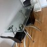 glass dining table with 3 leather chairs Image 2