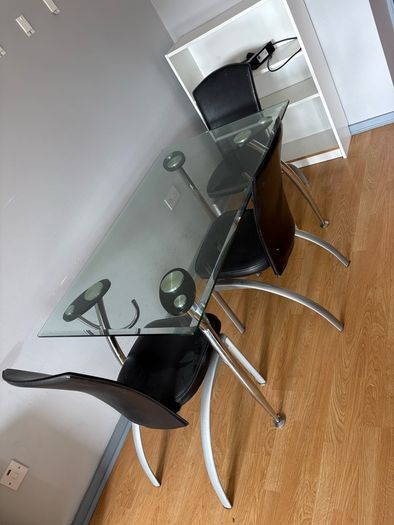 glass dining table with 3 leather chairs