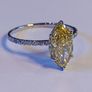 14k Gold ring with 2.29 ct Lab-Grown Diamond, 2.11 ct main yellow diamond cerified by IGI and Laser inscripted Image 3