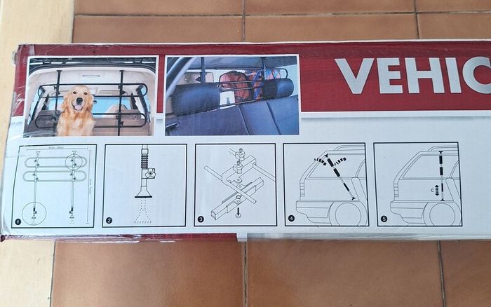 Vehicle pet barrier
