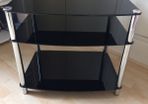 Multipurpose black glass table