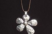 Silver daisy pendant