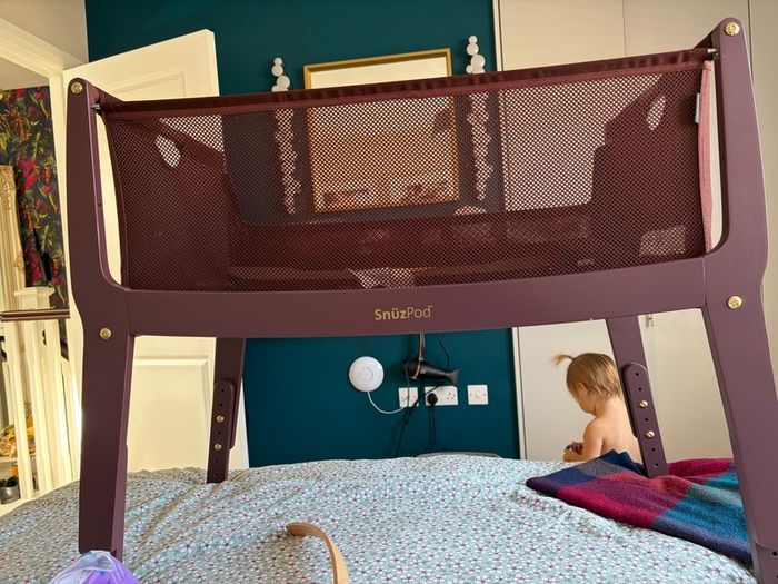 Snuzpod burgundy next to me crib