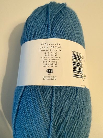 6 balls of blue yarn wool