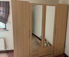 Large wardrobe partially dismantled but otherwise in good condition