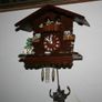 Wall Clock - the figures in the upper part of the clock are constantly moving - in working order Image 8