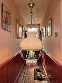 Vintage style hanging ceiling light with floral detail