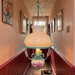 Vintage style hanging ceiling light with floral detail