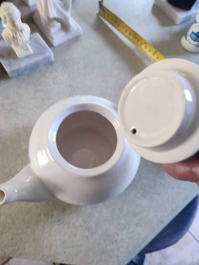 Vintage small white tea pot.