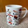 A Mug Featuring Different Types of Sushi Image 4