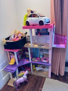 Barbie DreamHouse Dollhouse with lots of Barbie dolls