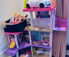 Barbie DreamHouse Dollhouse with lots of Barbie dolls
