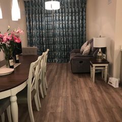 Custom-made floor-to-ceiling blackout curtains