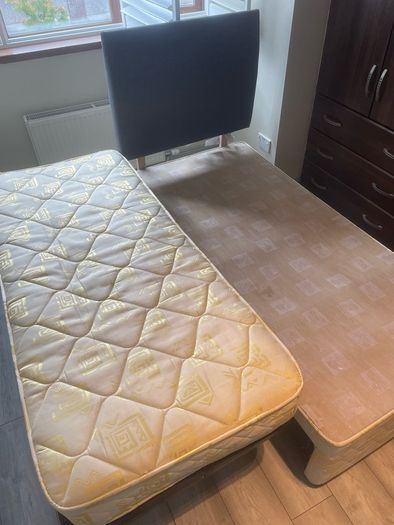 Single bed frame with guest mattress and headboard