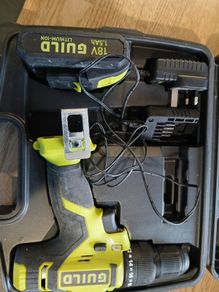 Cordless drill with charger in case