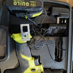 Cordless drill with charger in case