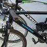 Two bikes one mountain one is a type of racing mountain bike Image 5