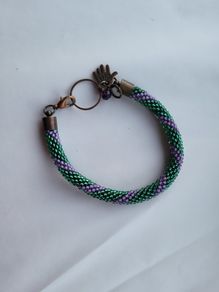 Handmade beaded rope and copper bracelet. purple and green