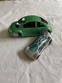Toy VW beetle and sport car