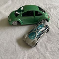 Toy VW beetle and sport car