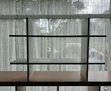 Wall shelving unit