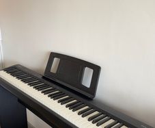 Roland FP-10 88-Key Digital Piano with Stand in Excellent Condition