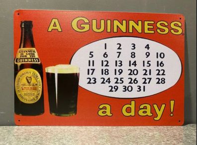 A Guinness A Day Tin Metal sign