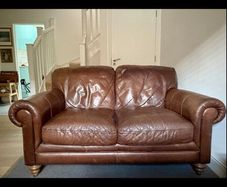 Natuzzi brown leather two seater sofa