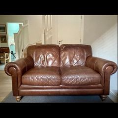Natuzzi brown leather two seater sofa