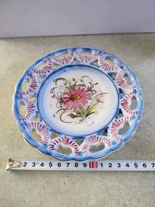 Vintage  flowery  hinging wall plat made in Portugal.