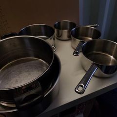 Saucepans, lids... plus knife sharpener