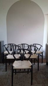 Six Iconic Black Wishbone Chairs