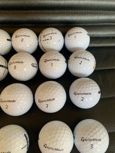 (23) TaylorMade Distance golf balls