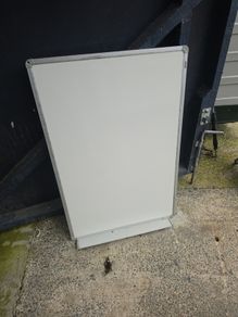 White board with Shelf