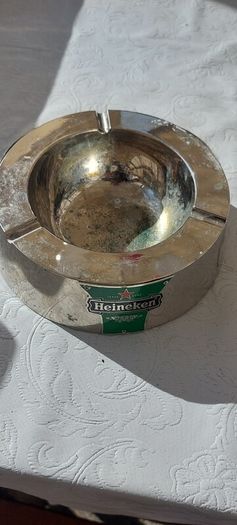Heineken metal ashtray ,used condition, still nice condition ,buyer collects or pays postage thank you, sold as is,